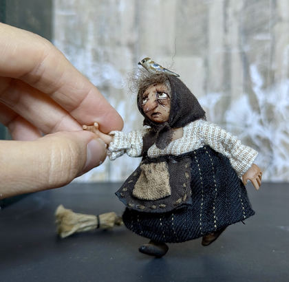 Full-scale view of a handmade gothic miniature — Small Baba Yaga with bird (2/7)