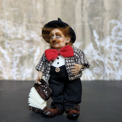 Small art doll Street Musician