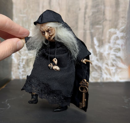 Full-scale view of a handmade gothic miniature — Small doll Witch (11/16), Acrylic paint, polymer clay, fabric
