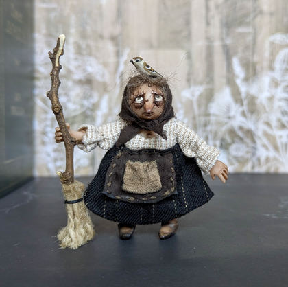 Full-scale view of a handmade gothic miniature — Small Baba Yaga with bird (3/7)