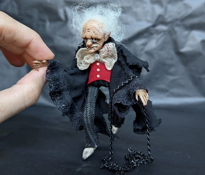Full-scale view of a handmade gothic miniature — Small doll Vampire (8/10), Acrylic paint, polymer clay, fabric