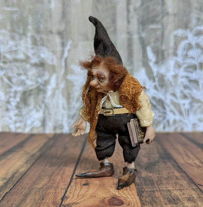 Full-scale view of a handmade gothic miniature — Small art doll Gnome with books (1/12), one-of-a-kind sculpture by Ritunia