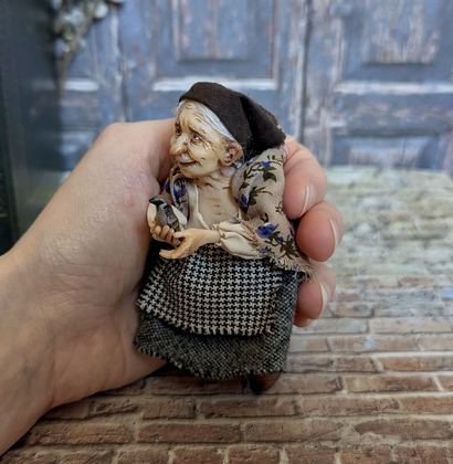 Full-scale view of a handmade gothic miniature — Granny with the bird (3/8), polymer clay, fabric, acrylics, varnish, wool