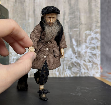 Full-scale view of a handmade gothic miniature — Small authors doll Man with the dog (7/15)
