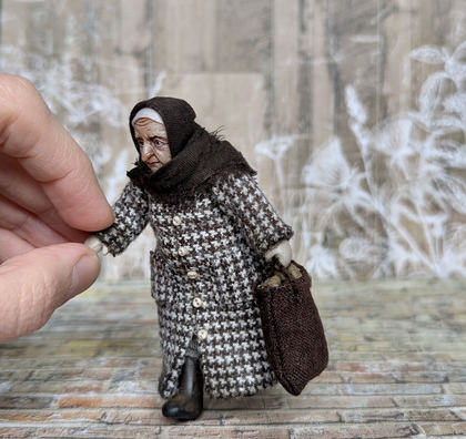 Close-up detail of a handmade gothic miniature — Small doll Granny, Acrylic paint, polymer clay, fabric