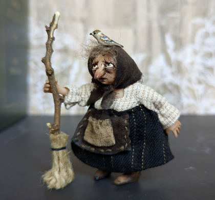 Small Baba Yaga with bird