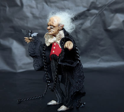 Full-scale view of a handmade gothic miniature — Small doll Vampire (4/10), Acrylic paint, polymer clay, fabric
