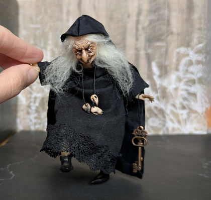 Full-scale view of a handmade gothic miniature — Small doll Witch (6/16), Acrylic paint, polymer clay, fabric