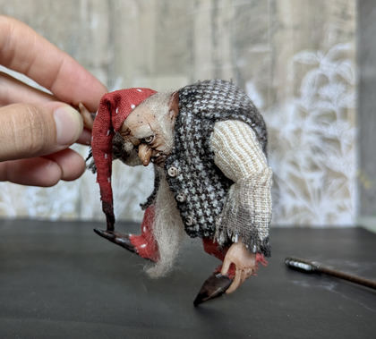 Full-scale view of a handmade gothic miniature — Small art doll Gnome with axe (8/10), one-of-a-kind sculpture by Ritunia