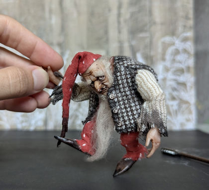 Full-scale view of a handmade gothic miniature — Small art doll Gnome with axe (4/10), one-of-a-kind sculpture by Ritunia