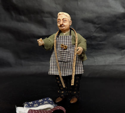 Close-up detail of a handmade gothic miniature — Small art doll Tailor, Acrylic paint, polymer clay, fabric