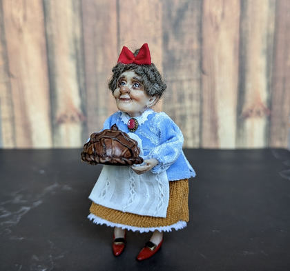 Full-scale view of a handmade gothic miniature — Small doll Granny with bread (6/9)
