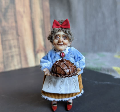 Full-scale view of a handmade gothic miniature — Small doll Granny with bread (5/9)